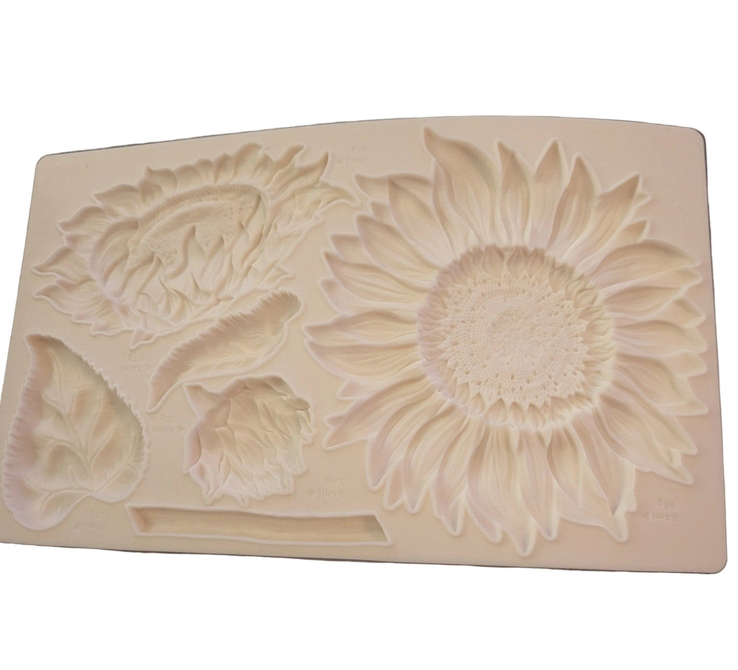 Silikonform, Stor solsikke med små blomster og blader. Veldig god å bruke med Stone art leire. 24x14 cm